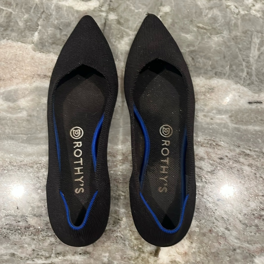Rothy’s black pointed toe flats size 9. Run small!